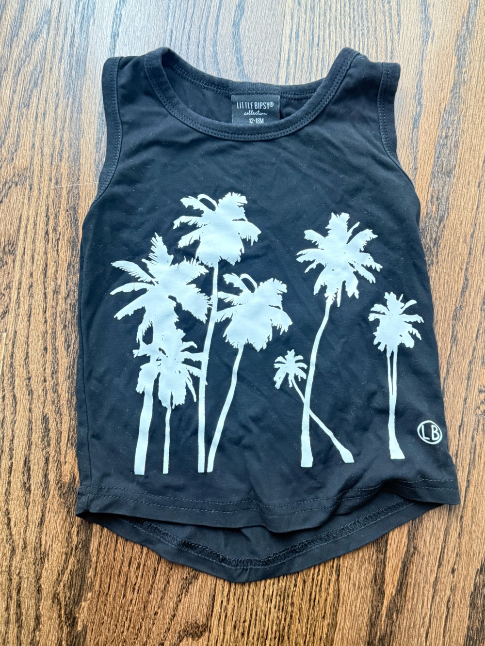 Little Bipsy Black Tank Top with White Palm Tree Graphic